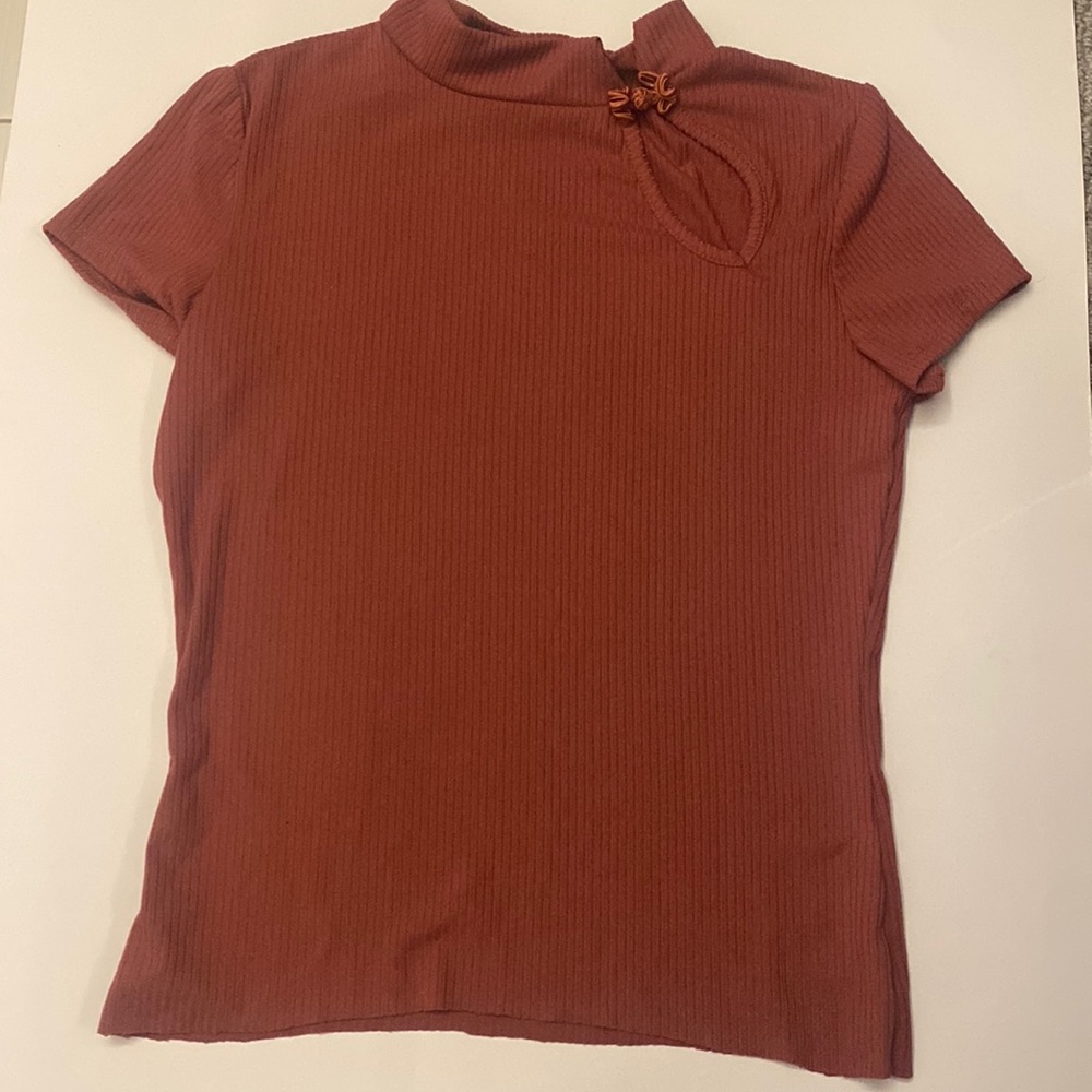 Casual blouse very fancy can take any wear and it’s a dark magenta color